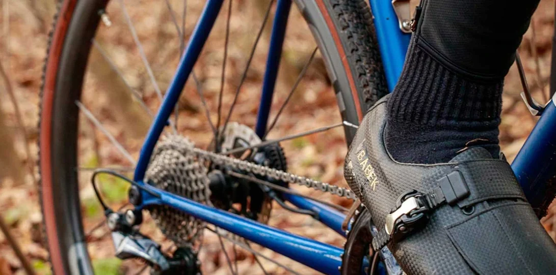 A close-up of the rear wheel and drivetrain of a gravel bike with IDEA ROUBAIX wheels