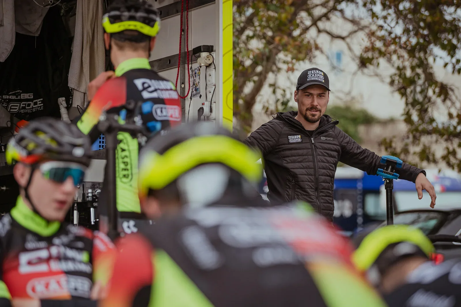 František Sisr among riders at the Kasper C4M team base