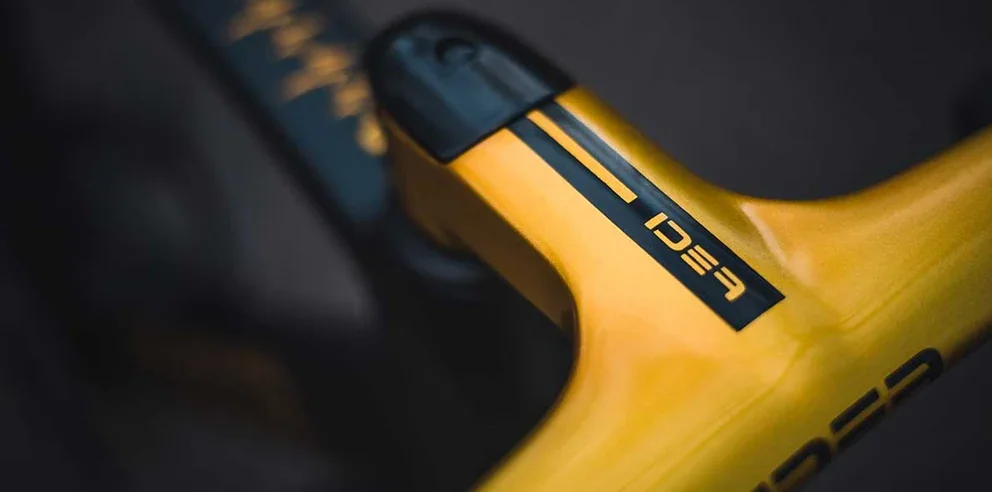 A close-up of the top tube and frame markings on the IDEA R1 AERO